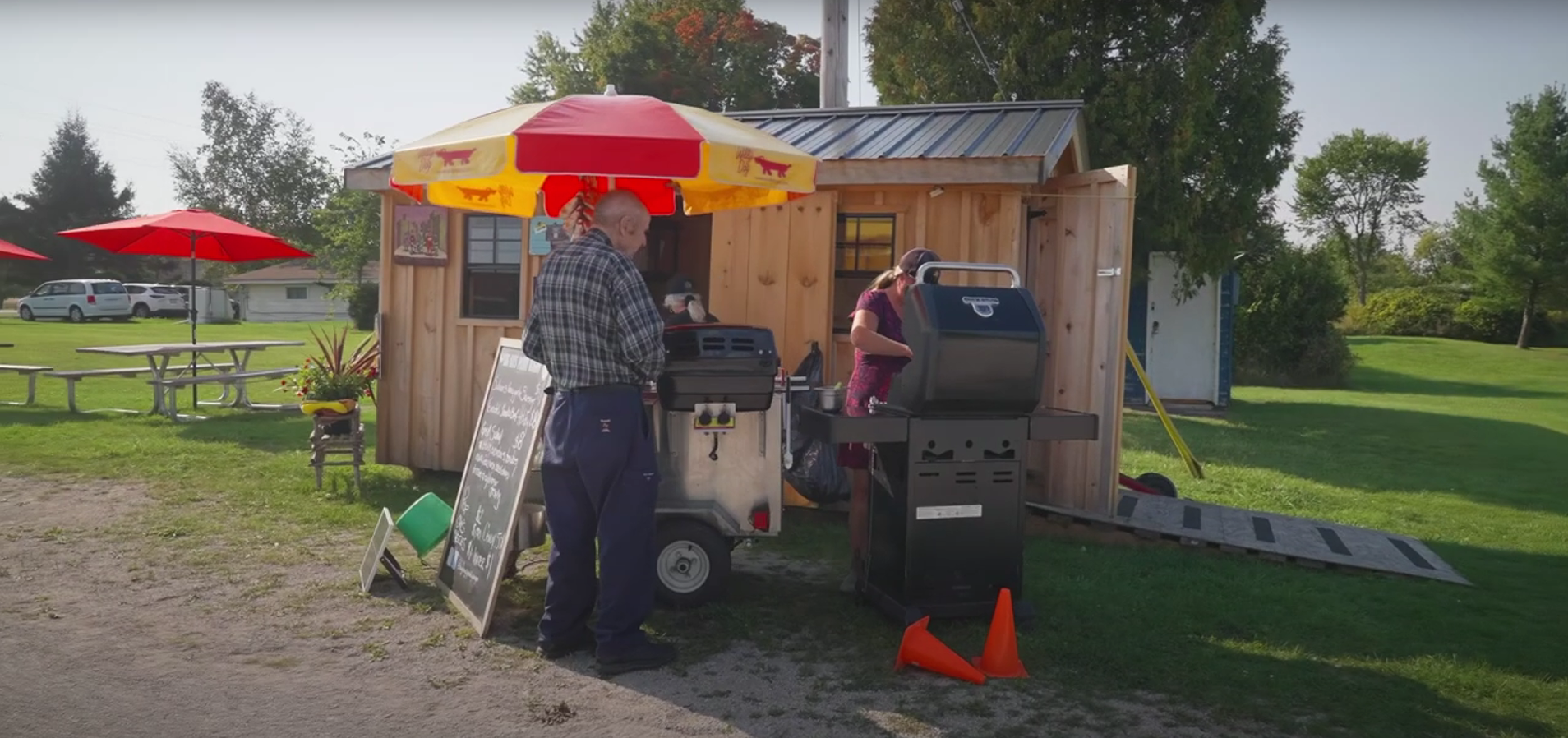 A man being served at a food truck